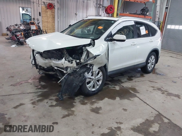 2014 Honda CR-V EX-L with VIN 5J6RM3H72EL012391, listed as a IAAI auction lot 41596897 with 99,000 mi miles and . Bid and sale history available at carsss.com. Image 2.