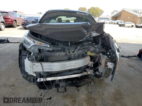 2019 Toyota C-HR XLE z VIN JTNKHMBX9K1026091, wystawiony jako Copart lot #50811835 z przebiegiem 86 424 mil mil oraz Szkoda całkowita • Salvage title. Historia ofert i sprzedaży dostępna na DreamBid. Obrazek 5.