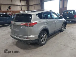 2017 Toyota RAV4 LE with VIN 2T3BFREV6HW642228, listed as a IAAI auction lot 41832543 with 127,830 mi miles. Bid and sale history available at carsss.com. Image 4.