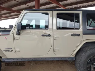 2017 Jeep Wrangler Unlimited Rubicon with VIN 1C4BJWFG7HL663203, listed as a IAAI auction lot 42391999 with 63,430 mi miles and . Bid and sale history available at DreamBid. Image 15.