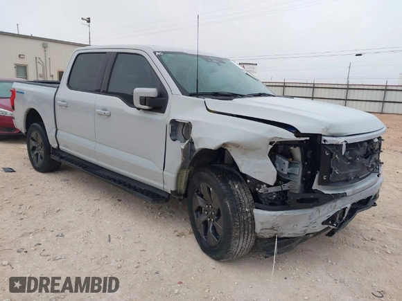 2023 Ford F-150 Lightning Pro z VIN 1FTVW1EL7PWG19070, wystawiony jako IAAI lot #41536193 z przebiegiem 22 654 mil mil oraz . Historia ofert i sprzedaży dostępna na DreamBid. Obrazek 1.