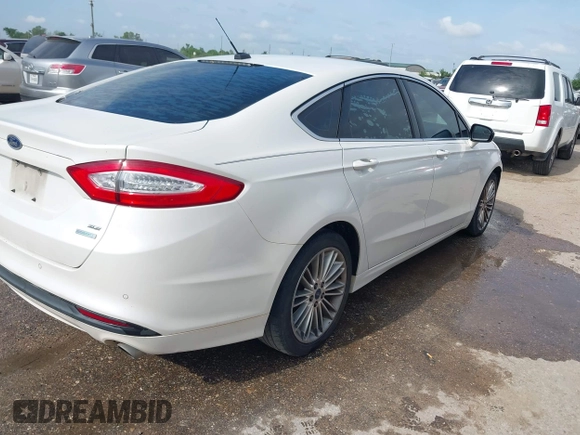 2014 Ford Fusion SE with VIN 3FA6P0HD8ER169211, listed as a IAAI auction lot 42038877 with 215,769 mi miles. Bid and sale history available at carsss.com. Image 4.