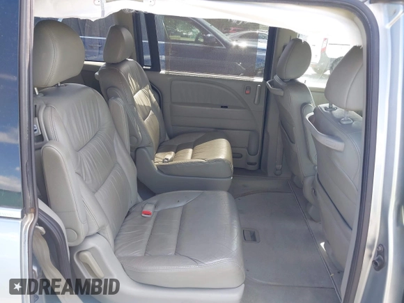 2010 Honda Odyssey EX-L with VIN 5FNRL3H74AB046578, listed as a IAAI auction lot 42049213 with 218,457 mi miles. Bid and sale history available at carsss.com. Image 8.