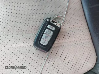 2012 Kia Sorento SX z VIN 5XYKWDA23CG231228, wystawiony jako IAAI lot #42366536 z przebiegiem 154 627 mil mil oraz . Historia ofert i sprzedaży dostępna na DreamBid. Obrazek 11.