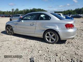 2009 BMW 1 Series 128i with VIN WBAUP93559VF48374, listed as a Copart auction lot 67668184 with 114,467 mi miles and Salvage Title. Bid and sale history available at carsss.com. Image 2.