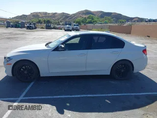 2014 BMW 3 Series 328d with VIN WBA3D3C5XEK156288, listed as a IAAI auction lot 42301663 with 84,416 mi miles and . Bid and sale history available at DreamBid. Image 14.