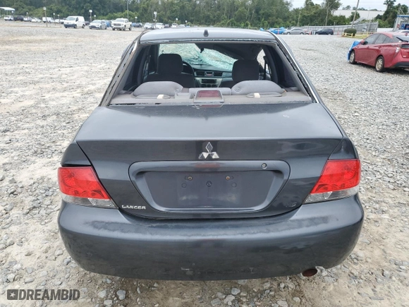 2004 Mitsubishi Lancer ES with VIN JA3AJ26EX4U043127, listed as a Copart auction lot 70471054 with 246,738 mi miles and Salvage Title. Bid and sale history available at carsss.com. Image 6.