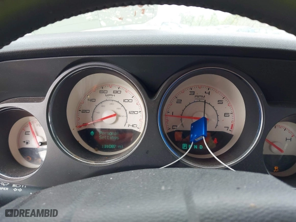 2013 Dodge Challenger SXT with VIN 2C3CDYAG2DH510772, listed as a IAAI auction lot 41417597 with 131,087 mi miles. Bid and sale history available at carsss.com. Image 7.
