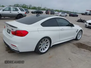 2015 BMW M4 z VIN WBS3R9C54FK329174, wystawiony jako IAAI lot #41923136 z przebiegiem 54 379 mil mil oraz . Historia ofert i sprzedaży dostępna na DreamBid. Obrazek 4.