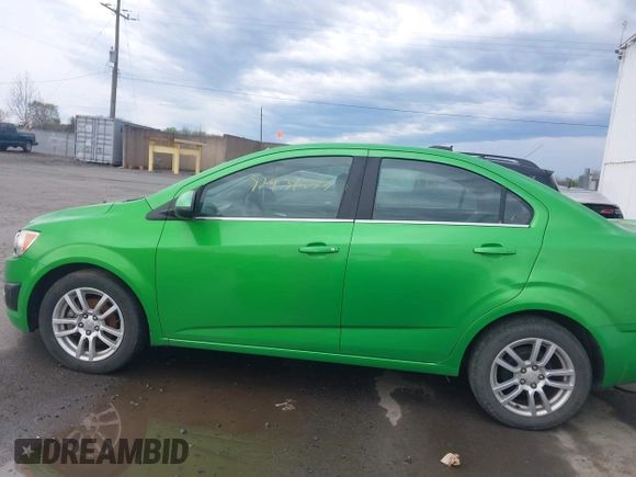 2015 Chevrolet Sonic LT with VIN 1G1JC5SH7F4152878, listed as a IAAI auction lot 41931277 with 180,189 mi miles and . Bid and sale history available at DreamBid. Image 14.