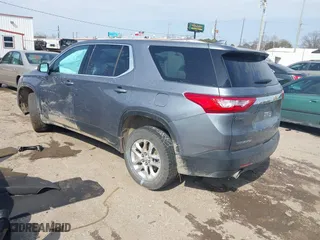 2021 Chevrolet Traverse LS with VIN 1GNERFKW0MJ158961, listed as a IAAI auction lot 41572644 with 66,675 mi miles. Bid and sale history available at carsss.com. Image 3.