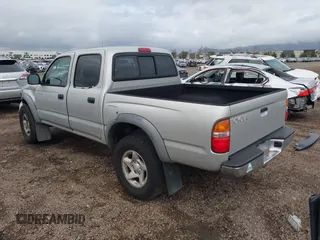 2002 Toyota Tacoma PreRunner with VIN 5TEGN92N42Z122098, listed as a IAAI auction lot 41725975 with 180,236 mi miles and . Bid and sale history available at DreamBid. Image 3.