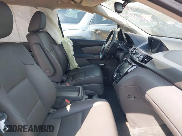 2016 Honda Odyssey EX-L with VIN 5FNRL5H61GB099699, listed as a IAAI auction lot 41807964 with 67,041 mi miles and . Bid and sale history available at DreamBid. Image 5.