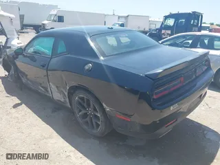 2023 Dodge Challenger SXT with VIN 2C3CDZAG3PH586933, listed as a IAAI auction lot 42001266 with 38,097 mi miles. Bid and sale history available at carsss.com. Image 3.