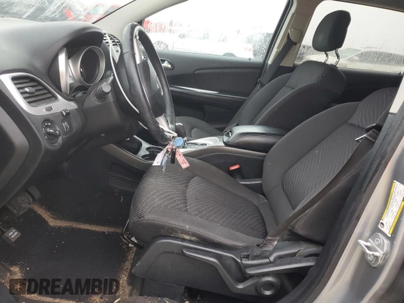 2017 Dodge Journey SXT with VIN 3C4PDCBB0HT545567, listed as a Copart auction lot 57766105 with 56,569 mi miles and Salvage title. Bid and sale history available at DreamBid. Image 7.