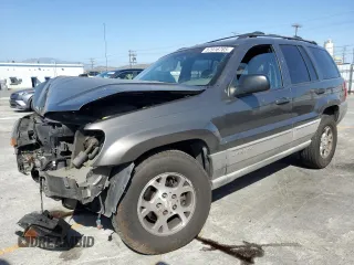 2000 Jeep Grand Cherokee Laredo с VIN 1J4G248S2YC377133, выставлен на аукционе Copart как лот 57916785 с пробегом 217 525 миль миль и Списание • Salvage title. История ставок и продаж доступна на DreamBid. Изображение 1.