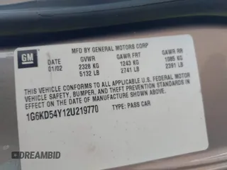 2002 Cadillac DeVille z VIN 1G6KD54Y12U219770, wystawiony jako IAAI lot #42474317 z przebiegiem 122 776 mil mil oraz . Historia ofert i sprzedaży dostępna na DreamBid. Obrazek 9.