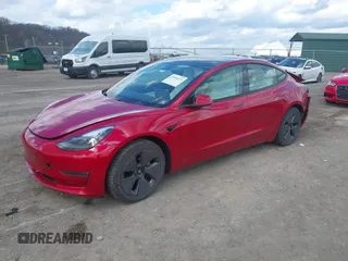 2021 Tesla Model 3 Long Range with VIN 5YJ3E1EB0MF902833, listed as a IAAI auction lot 41854474 with 41,982 mi miles and . Bid and sale history available at DreamBid. Image 2.