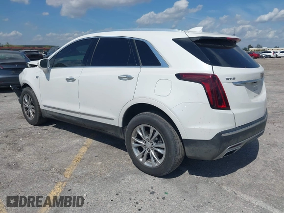 2020 Cadillac XT5 Premium Luxury FWD with VIN 1GYKNCRS7LZ129119, listed as a IAAI auction lot 41710878 with 52,575 mi miles and . Bid and sale history available at carsss.com. Image 3.