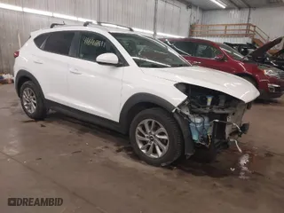 2016 Hyundai Tucson SE with VIN KM8J33A48GU117807, listed as a IAAI auction lot 41642891 with 142,371 mi miles. Bid and sale history available at carsss.com. Image 1.