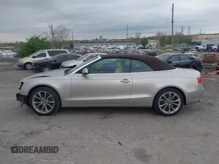 2014 Audi A5 Premium Plus z VIN WAULFAFH7EN001894, wystawiony jako IAAI lot #42082669 z przebiegiem 78 624 mil mil oraz . Historia ofert i sprzedaży dostępna na DreamBid. Obrazek 14.