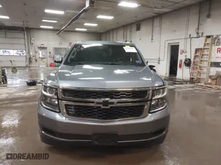 2019 Chevrolet Suburban LT with VIN 1GNSKHKC3KR195042, listed as a IAAI auction lot 41704591 with 107,166 mi miles. Bid and sale history available at carsss.com. Image 12.
