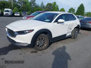 2023 Mazda CX-30 S with VIN 3MVDMBAM8PM545288, listed as a IAAI auction lot 42198433 with 19,609 mi miles and . Bid and sale history available at DreamBid. Image 2.