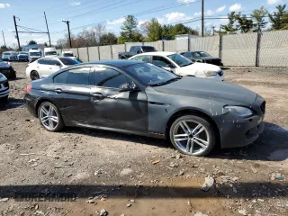 2015 BMW 6 Series 640i with VIN WBA6A0C5XFD318947, listed as a Copart auction lot 50228615 with 78,202 mi miles and Salvage Title. Bid and sale history available at carsss.com. Image 4.