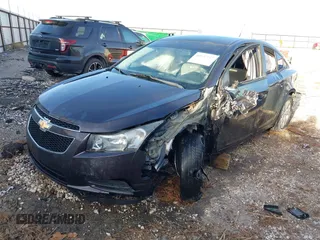 2014 Chevrolet Cruze LS z VIN 1G1PA5SH9E7480168, wystawiony jako IAAI lot #40937117 z przebiegiem 127 982 mil mil oraz . Historia ofert i sprzedaży dostępna na DreamBid. Obrazek 6.