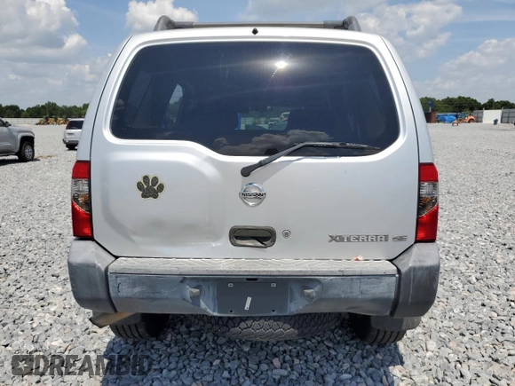 2004 Nissan Xterra XE z VIN 5N1ED28T04C659829, wystawiony jako Copart lot #57633085 z przebiegiem 180 057 mil mil oraz Szkody całkowita. Historia ofert i sprzedaży dostępna na DreamBid. Obrazek 6.
