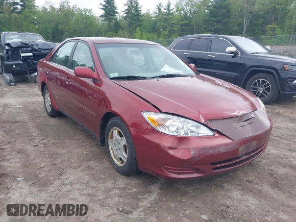 2003 Toyota Camry LE z VIN 4T1BF32K63U050174, wystawiony jako IAAI lot #42260843 z przebiegiem 210 486 mil mil oraz . Historia ofert i sprzedaży dostępna na DreamBid. Obrazek 6.