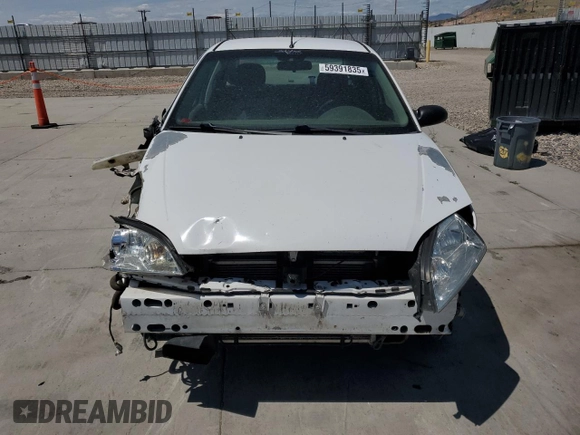 2005 Ford Focus S with VIN 1FAFP34N05W296550, listed as a Copart auction lot 59391835 with 216,509 mi miles and Salvage title. Bid and sale history available at DreamBid. Image 5.