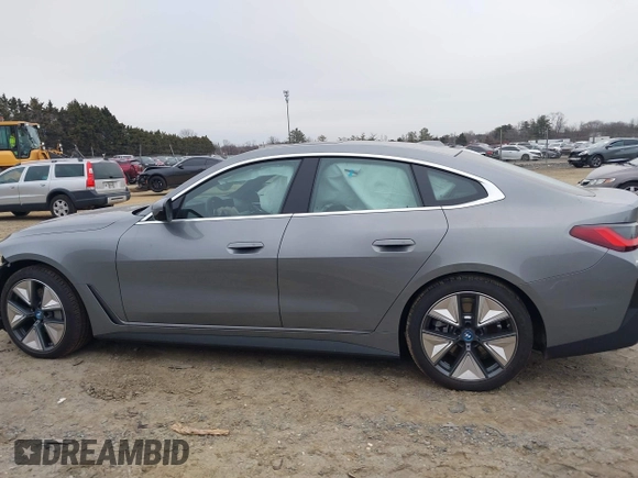 2024 BMW i4 eDrive35 z VIN WBY43AW05RFT22034, wystawiony jako IAAI lot #41545162 z przebiegiem 1499 mil mil oraz . Historia ofert i sprzedaży dostępna na DreamBid. Obrazek 14.