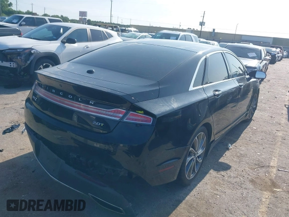 2018 Lincoln MKZ Select z VIN 3LN6L5C90JR625598, wystawiony jako IAAI lot #42189498 z przebiegiem 98 803 mil mil oraz . Historia ofert i sprzedaży dostępna na DreamBid. Obrazek 4.