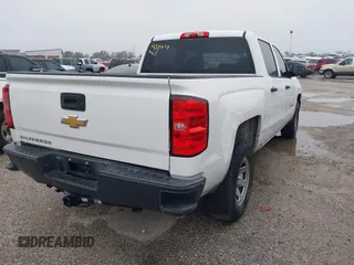 2016 Chevrolet Silverado 1500 Work Truck with VIN 3GCPCNEC5GG256095, listed as a IAAI auction lot 41404492 with 165,184 mi miles and . Bid and sale history available at DreamBid. Image 4.