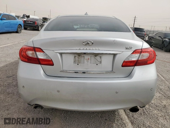 2013 Infiniti M с VIN JN1BY1AP2DM512105, выставлен на аукционе Copart как лот 57183655 с пробегом 159 180 миль миль и Списание • Salvage title. История ставок и продаж доступна на DreamBid. Изображение 6.