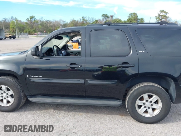2009 GMC Yukon SLT 4SB with VIN 1GKFK33049R209059, listed as a IAAI auction lot 41673686 with 206,570 mi miles and . Bid and sale history available at DreamBid. Image 14.