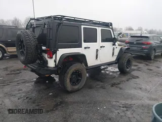2016 Jeep Wrangler Unlimited Rubicon with VIN 1C4BJWFGXGL185227, listed as a IAAI auction lot 41555159 with 1 mi miles. Bid and sale history available at carsss.com. Image 4.