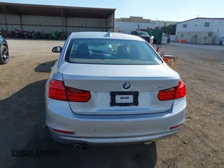 2013 BMW 3 Series 328i with VIN WBA3C1C52DF440786, listed as a IAAI auction lot 40777716 with 171,385 mi miles. Bid and sale history available at carsss.com. Image 16.