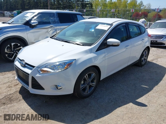 2014 Ford Focus SE with VIN 1FADP3K22EL454565, listed as a IAAI auction lot 42054653 with 19,118 mi miles. Bid and sale history available at carsss.com. Image 2.