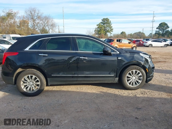 2019 Cadillac XT5 Luxury FWD z VIN 1GYKNCRSXKZ102866, wystawiony jako IAAI lot #41335840 z przebiegiem 59 563 mil mil oraz . Historia ofert i sprzedaży dostępna na DreamBid. Obrazek 13.