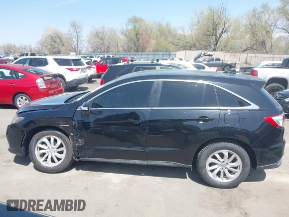 2017 Acura RDX Technology with VIN 5J8TB3H56HL014036, listed as a IAAI auction lot 41980079 with 124,683 mi miles and . Bid and sale history available at DreamBid. Image 14.