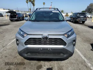 2021 Toyota RAV4 XLE Premium with VIN 2T3C1RFV4MC148429, listed as a Copart auction lot 58264395 with 26,799 mi miles and Salvage title. Bid and sale history available at DreamBid. Image 5.