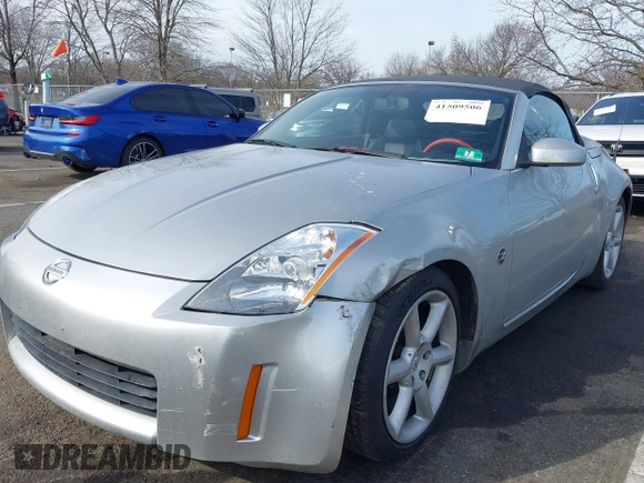 2005 Nissan 350Z Touring z VIN JN1AZ36A05M755776, wystawiony jako IAAI lot #41509506 z przebiegiem 79 148 mil mil oraz . Historia ofert i sprzedaży dostępna na DreamBid. Obrazek 6.