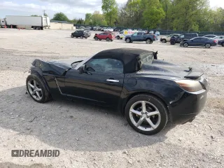 2009 Saturn Sky Red Line z VIN 1G8MT35X19Y106675, wystawiony jako Copart lot #53101595 z przebiegiem 155 314 mil mil oraz Tytuł czysty. Historia ofert i sprzedaży dostępna na DreamBid. Obrazek 2.