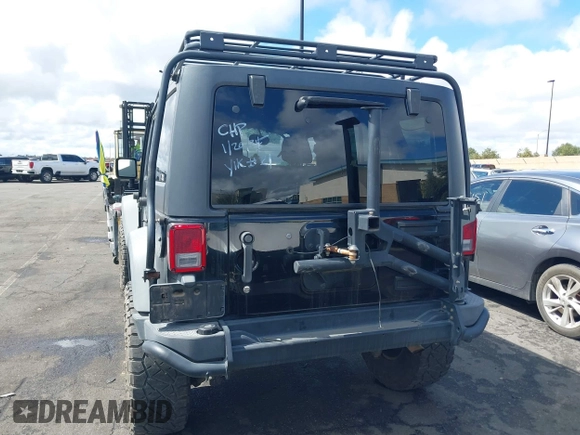 2014 Jeep Wrangler Unlimited Rubicon with VIN 1C4BJWFGXEL172622, listed as a IAAI auction lot 41782796 with 67,594 mi miles. Bid and sale history available at carsss.com. Image 17.