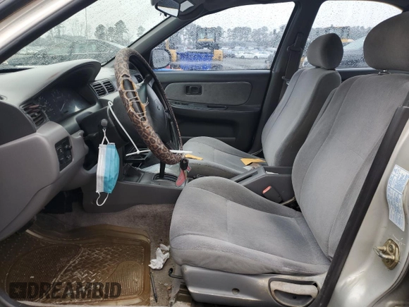 1996 Nissan Sentra XE z VIN 1N4AB41D2TC767557, wystawiony jako Copart lot #42553245 z przebiegiem 148 514 mil mil oraz Szkoda całkowita • Salvage title. Historia ofert i sprzedaży dostępna na DreamBid. Obrazek 7.