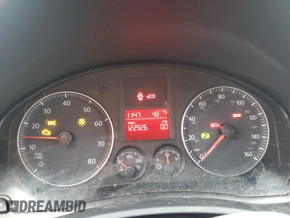 2009 Volkswagen Rabbit S with VIN WVWBB71K89W004528, listed as a Copart auction lot 80742174 with 122,926 mi miles and Salvage title. Bid and sale history available at DreamBid. Image 9.
