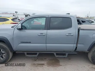 2021 Toyota Tacoma 4WD SR5 with VIN 3TMDZ5BN5MM116584, listed as a IAAI auction lot 41548175 with 23,031 mi miles. Bid and sale history available at carsss.com. Image 14.