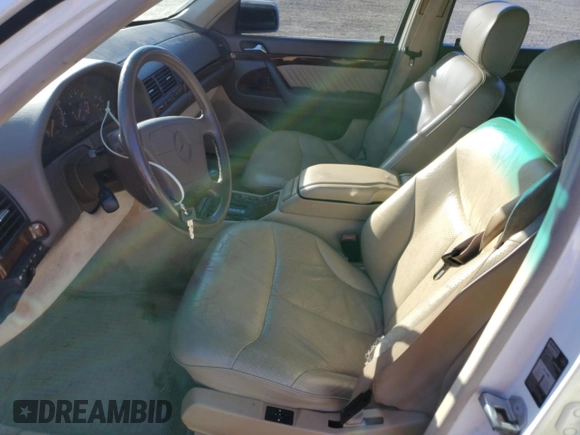 1995 Mercedes-Benz S with VIN WDBGA51E1SA225395, listed as a Copart auction lot 81313224 with 128,402 mi miles and Clean Title. Bid and sale history available at DreamBid. Image 7.